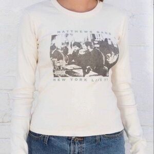 Brandy Melville Cream Long Sleeve Tee with Band Graphic